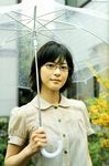  glasses highres photo short_hair tagme_model umbrella 