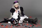  cosplay feathers frills kneehighs petals photo rose_petals rozen_maiden ruffles silver_hair suigintou suzukaze_yuuki 