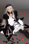  cosplay feathers frills highres kneehighs petals photo rose_petals rozen_maiden ruffles silver_hair suigintou suzukaze_yuuki 