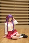  cosplay footwear hair_ribbon hair_ribbons highres hiiragi_kagami lucky_star naito photo purple_hair ribbon sailor sailor_uniform school_uniform serafuku socks twintails 