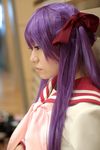  cosplay footwear hair_ribbon hair_ribbons highres hiiragi_kagami lucky_star naito photo purple_hair ribbon sailor sailor_uniform school_uniform serafuku socks twintails 