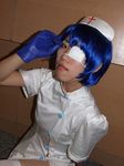  cosplay eyepatch gloves ikkitousen nurse nurse_uniform photo ryomou_shimei ryomou_shimei_(cosplay) sakura_marimo thigh-highs thighhighs 