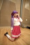  cosplay footwear hair_ribbon hair_ribbons highres hiiragi_kagami lucky_star naito photo purple_hair ribbon sailor sailor_uniform school_uniform serafuku socks twintails 