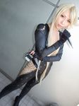  aya_(model) blonde_hair breasts cleavage cosplay kasuga knife kunoichi ninja photo sengoku_basara skin_tight 