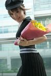  1girl asian bling bouquet brown_eyes brown_hair female flower hat highres jewelry kipi-san necklace photo short_hair smile solo sunflower 