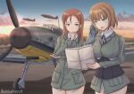  2girls aircraft airplane blue_eyes blush brave_witches breasts brown_hair cloud corset green_jacket gundula_rall hand_on_own_chin highres holding jacket large_breasts long_hair military military_uniform minna-dietlinde_wilcke multiple_girls no_panties open_mouth outdoors paper red_eyes red_hair shikabiscuit short_hair standing strike_witches sunset twitter_username world_witches_series 