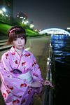  1girl cityscape hairband highres japanese_clothes kimono night night-shots photo shio sky solo strawberry_pattern water waterfront 