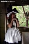  apron cosplay dress female highres kirisame_marisa photo saku touhou witch 