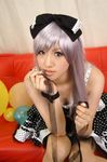  1girl balloon balloons bow cosplay couch dress female hair_bow hairbow nail_polish photo polka_dot polka_dot_dress red_upholstery ribbon saya saya_(cosplayer) silver_hair sitting solo 