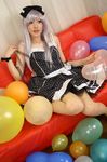  balloon balloons bow cosplay couch dress hair_bow hairbow photo polka_dot polka_dot_dress red_upholstery ribbon saya saya_(cosplayer) silver_hair sitting 