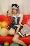  balloon balloons bow cosplay couch dress hair_bow hairbow nail_polish photo polka_dot polka_dot_dress red_upholstery ribbon saya saya_(cosplayer) silver_hair sitting 