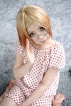  blonde_hair child cosplay dress glasses highres ichigo_mashimaro mamiya_tamaki photo sakuragi_matsuri strawberry_pattern 