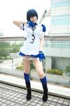  blue_hair boots cosplay cuffs eyepatch gloves handcuffs highres ikkitousen kneehighs maid maid_apron maid_uniform namada photo ryomou_shimei ryomou_shimei_(cosplay) 