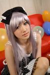  1girl balloon balloons bow cosplay couch dress hair_bow hairbow photo red_upholstery ribbon saya saya_(cosplayer) silver_hair 