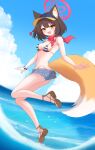  1girl absurdres animal_ear_fluff animal_ears backless_bikini_bottom beach bikini blue_archive breasts colored_inner_animal_ears commentary_request denim denim_shorts eyeshadow fox_ears fox_girl fox_tail full_body halo highleg highleg_bikini highres izuna_(blue_archive) izuna_(swimsuit)_(blue_archive) knom looking_at_viewer makeup micro_shorts red_eyeshadow red_scarf scarf shorts smile solo striped_bikini striped_clothes swimsuit tail visor_cap 