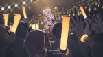  1girl absurdres audience auklet5580 blonde_hair bracelet brown_eyes character_doll cho_kaguya-hime! commentary_request doll glowstick hair_bun highres holding holding_glowstick jewelry kaguya_(cho_kaguya-hime!) kaguya_(return)_(cho_kaguya-hime!) kaguya_(tsukuyomi)_(cho_kaguya-hime!) long_hair microphone open_mouth penlight_(glowstick) people single_side_bun 