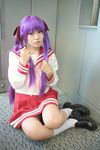  cosplay footwear hair_ribbon hair_ribbons highres hiiragi_kagami lucky_star naito photo purple_hair ribbon sailor sailor_uniform school_uniform serafuku socks twintails 