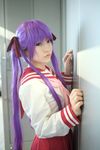  cosplay hair_ribbon hair_ribbons highres hiiragi_kagami lucky_star naito photo purple_hair ribbon sailor sailor_uniform school_uniform serafuku twintails 