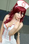  cosplay emi_kou_(model) fishnet_legwear fishnet_stockings fishnets legwear nurse nurse_uniform photo red_hair redhead 