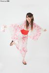  1girl balancing highres japanese_clothes kimono obi photo print_dress print_kimono sandals sash solo yukata yukina 