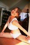  asian female girl highres kamata_natsumi photo shorts smile stretch stretching tank_top women 