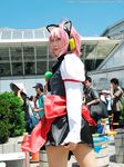  ahoge animal_ears asian cat_ears cosplay highres microphone moe-tan moetan nanami_akua photo pink_hair tempera_sumi 