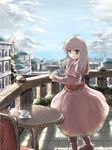  ahoge balcony bow capelet chair cityscape cloud cup day dress green_eyes highres long_hair ocean open_mouth original pink_dress risutaru saucer silver_hair sky smile solo table teacup teapot 