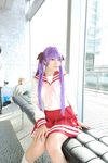  cosplay footwear hair_ribbon hair_ribbons highres hiiragi_kagami lucky_star naito photo purple_hair ribbon sailor sailor_uniform school_uniform serafuku socks twintails 