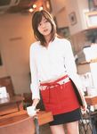  1girl apron asian brown_hair cosplay highres indoors long_hair miniskirt photo serving_tray skirt solo sugimoto_yumi tray waitress 