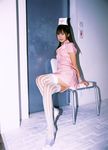  cosplay hamada_shoko highres nurse nurse_uniform photo thigh-highs thighhighs vertical_stripes 