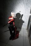  boots capcom cosplay dante devil_may_cry gun highres leather leather_pants overcoat pants photo reizi silver_hair weapon 
