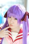  cosplay hair_ribbon hair_ribbons highres hiiragi_kagami lucky_star naito photo purple_hair ribbon sailor sailor_uniform school_uniform serafuku twintails 