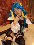  arc_system_works blue_hair boots cosplay dizzy garters guilty_gear kabura_hitori_(model) midriff photo thigh-highs thighhighs twintails 