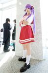  cosplay footwear hair_ribbon hair_ribbons highres hiiragi_kagami lucky_star naito photo purple_hair ribbon sailor sailor_uniform school_uniform serafuku socks twintails 