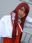  1girl aty belt cape cosplay dress glasses long_hair mitsuo_(model) photo red_hair redhead solo summon_night summon_night_3 