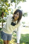  blouse cosplay highres nagasaki_rina photo pleated_skirt school_uniform serafuku skirt sleeveless_sweater sweater_vest 