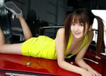  breasts car hamada_shoko highres jumpsuit motor_vehicle photo romper sideboob spitfire_(car) twintails vehicle 