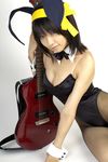  animal_ears asian bow bowtie breasts bunny_ears bunny_girl cleavage cosplay costume fishnet_legwear fishnet_stockings fishnets guitar hair_ribbon hair_ribbons highres instrument legwear leotard matsunaga_ayaka photo real ribbon suzumiya_haruhi suzumiya_haruhi_no_yuuutsu thighhighs 