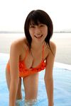  1girl bikini bra breasts brown_hair cleavage dripping fog hanging_breasts hara_mikie japanese large_breasts laughing leaning_forward long_hair photo pool smile squeezing standing swimsuit underwear water waves wet 