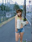  denim highres hoshino_aki photo rapture shirt_lift shorts tank_top 