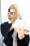  ari_(model) blonde_hair cosplay deidara handmouth headband highres naruto naruto_shippuuden photo 