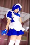  cosplay cuffs eyepatch gloves handcuffs highres ikkitousen maid maid_apron maid_uniform photo riori ryomou_shimei ryomou_shimei_(cosplay) thigh-highs thighhighs 