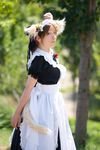  anya apron cosplay dog_ears highres maid maid_apron maid_uniform photo tail 