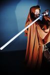  beard boots cloak cosplay energy_sword facial_hair highres jedi lightsaber obi-wan_kenobi photo sakuya_siina star_wars sword weapon 