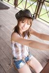  autumn_breeze cowboy_hat denim hat highres ogura_yuko ogura_yuuko photo plaid shorts sleeveless tassel tassels 