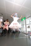  blue_hair cosplay highres jumping kouno_tooru kouzuki_suzuka nurse nurse_uniform photo princess_princess 
