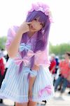  :p adapted_costume akanbe between_legs cosplay enako hair_ribbon hand_between_legs hat long_hair looking_at_viewer patchouli_knowledge photo purple_hair ribbon solo tongue tongue_out touhou 