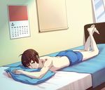  barefoot bed brown_eyes brown_hair calendar_(object) dutch_angle kaja kyon lying male_focus on_stomach pillow shirtless shorts solo suzumiya_haruhi_no_yuuutsu 