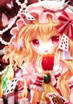  apple blonde_hair brooch bug butterfly candle card fang fire flandre_scarlet food fruit hat highres insect jewelry playing_card red_eyes short_hair side_ponytail solo touhou wings wrist_cuffs yuki_201 