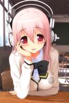  absurdres blush bow breasts chin_rest headphones highres large_breasts long_hair looking_at_viewer nitroplus open_mouth parted_lips pink_hair red_eyes school_uniform smile solo super_sonico tsuji_santa 